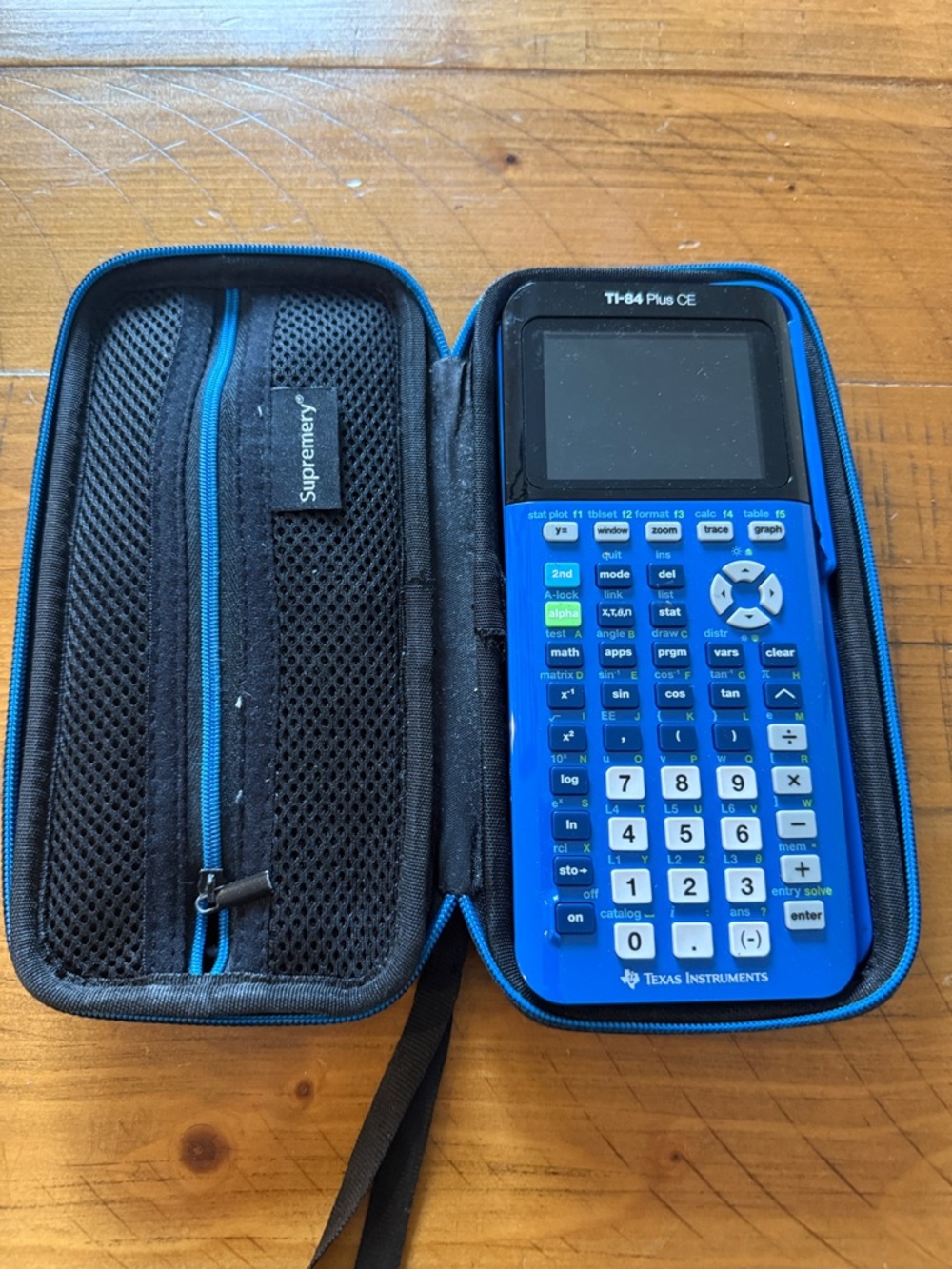 Texas Instruments Blue TI-84 Plus CE Graphing Calculator with Black Zip Case